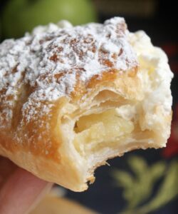 Handheld apple turnover with cream