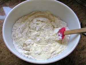 stirring yogurt mixture into flour