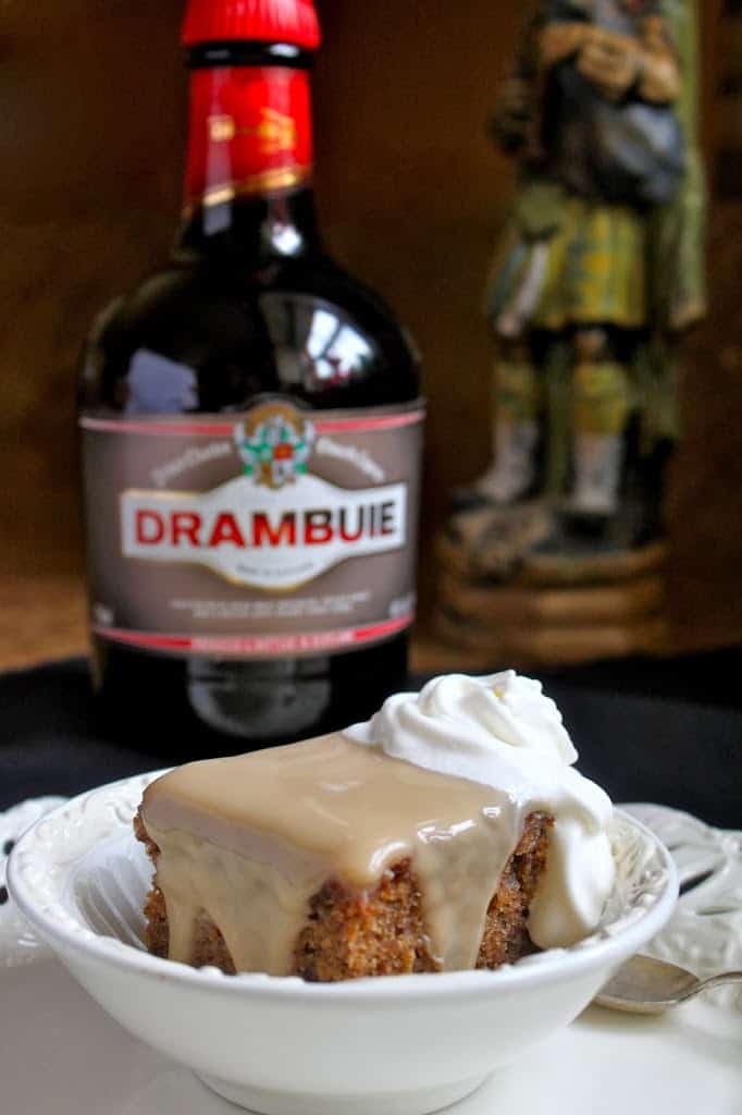 Sticky Toffee Pudding with Drambuie bottle in the background
