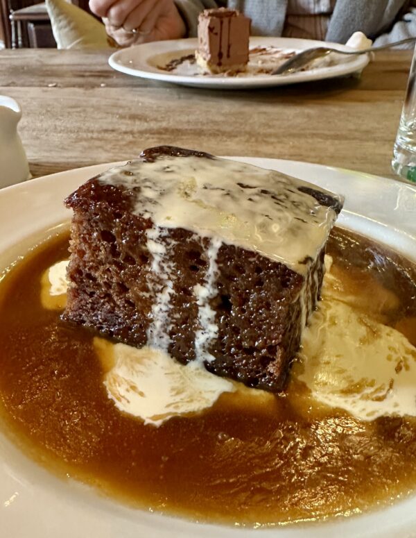 sticky toffee pudding served with cream