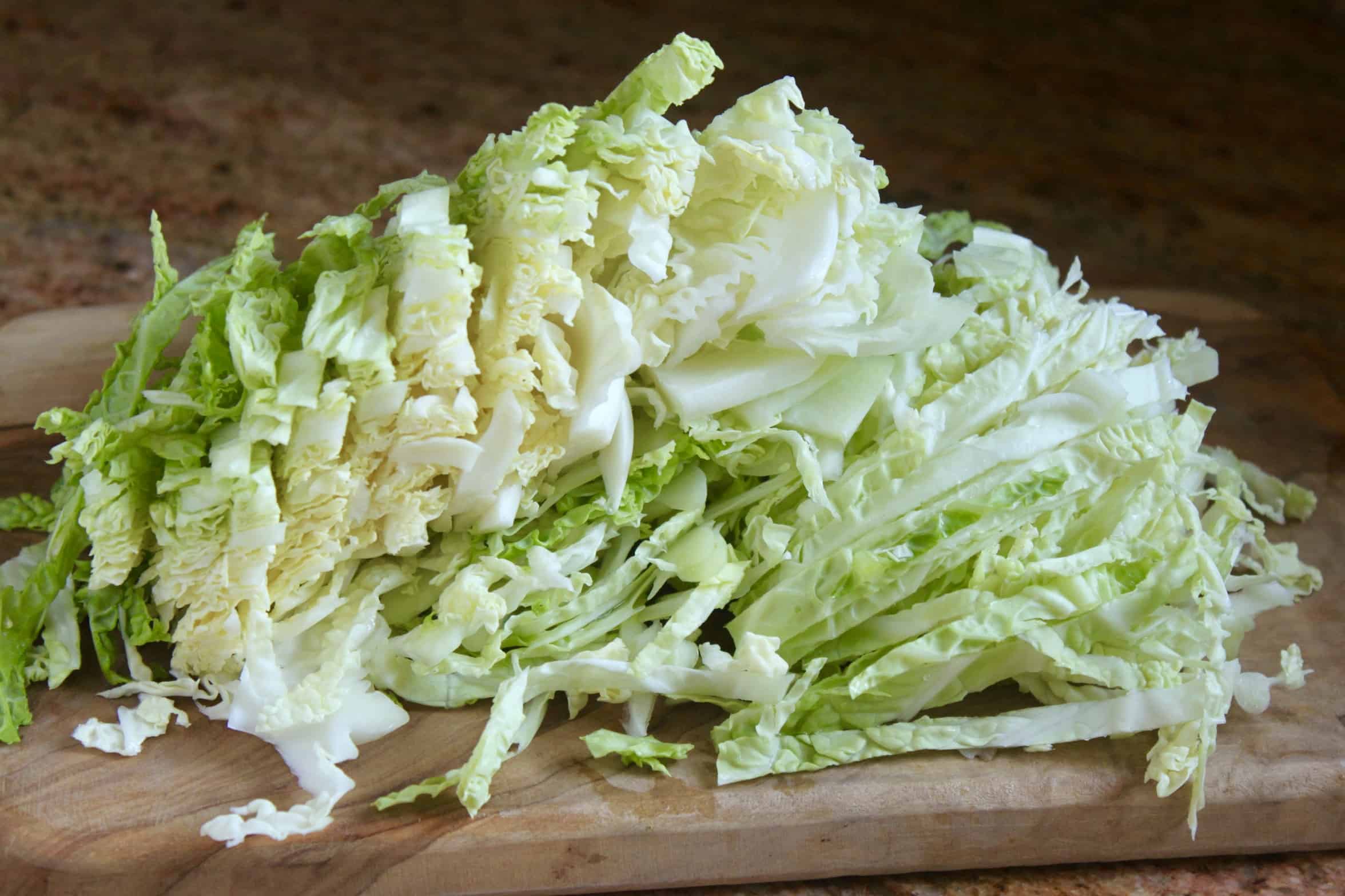 shredded cabbage on a board