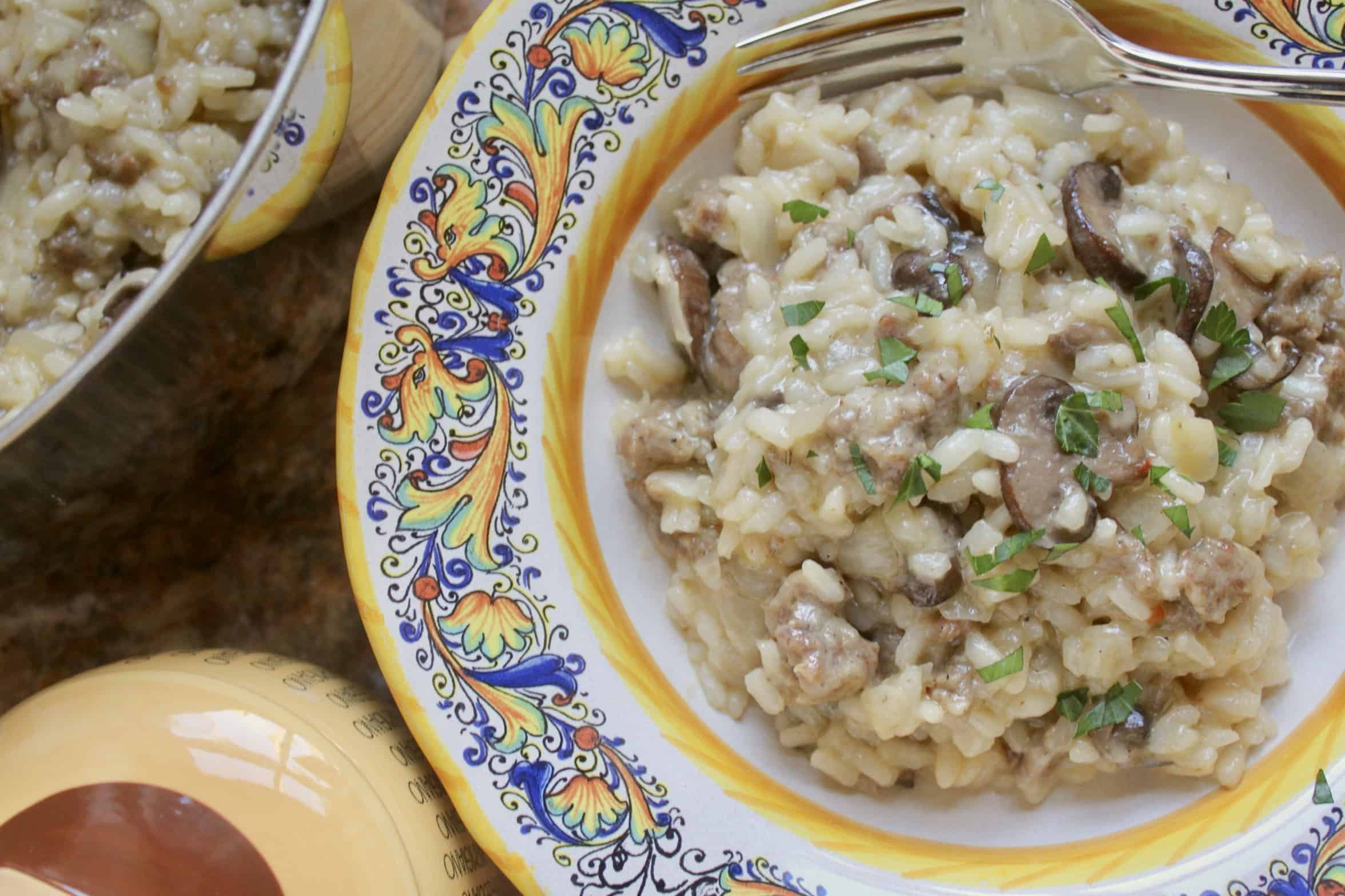 flat lay sausage and mushroom risotto in a bowl