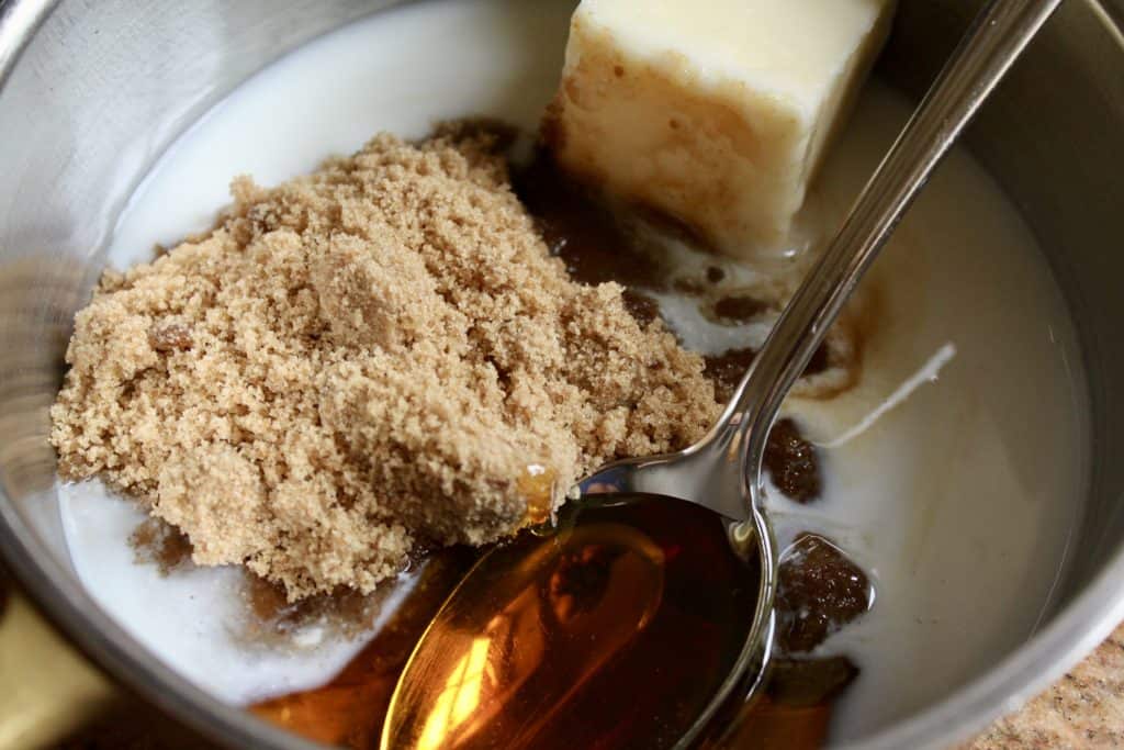 making the whisky sauce with syrup, brown sugar butter and cream