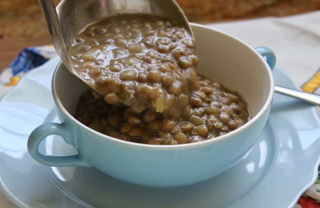 serving lentil soup