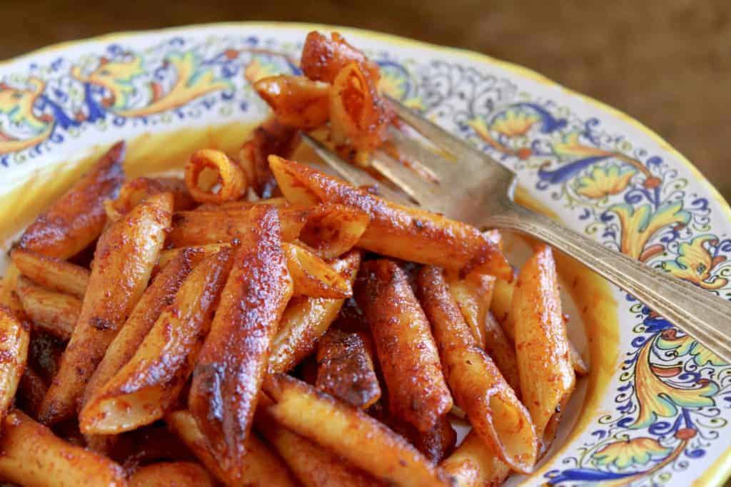 crispy leftover pasta in a pretty Italian bowl