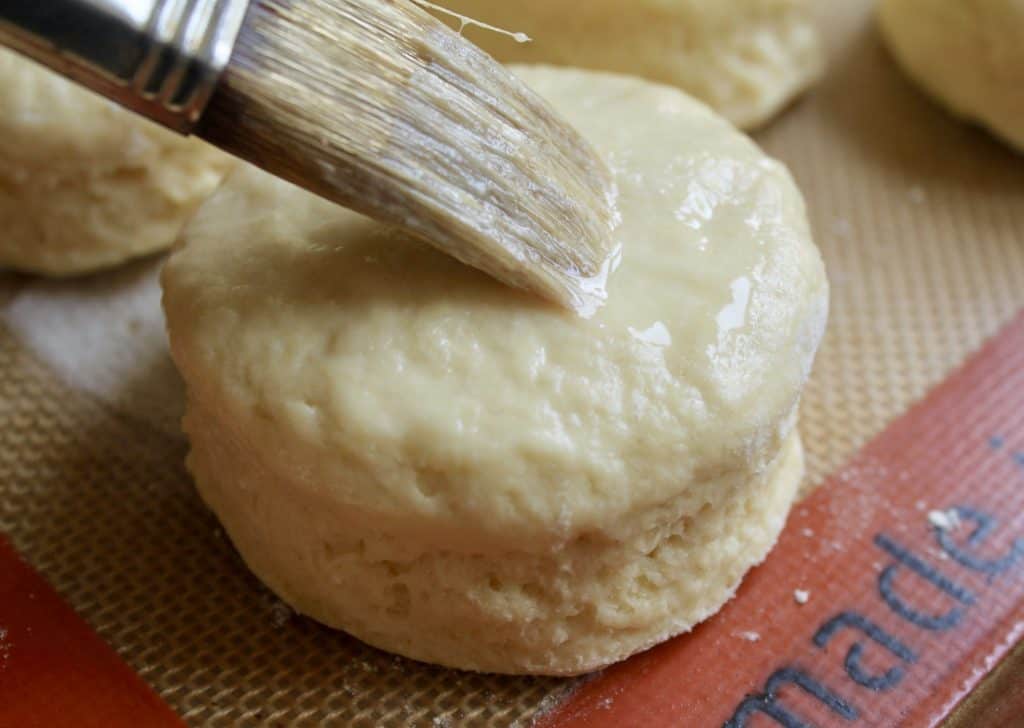 brushing scones with egg and buttermilk