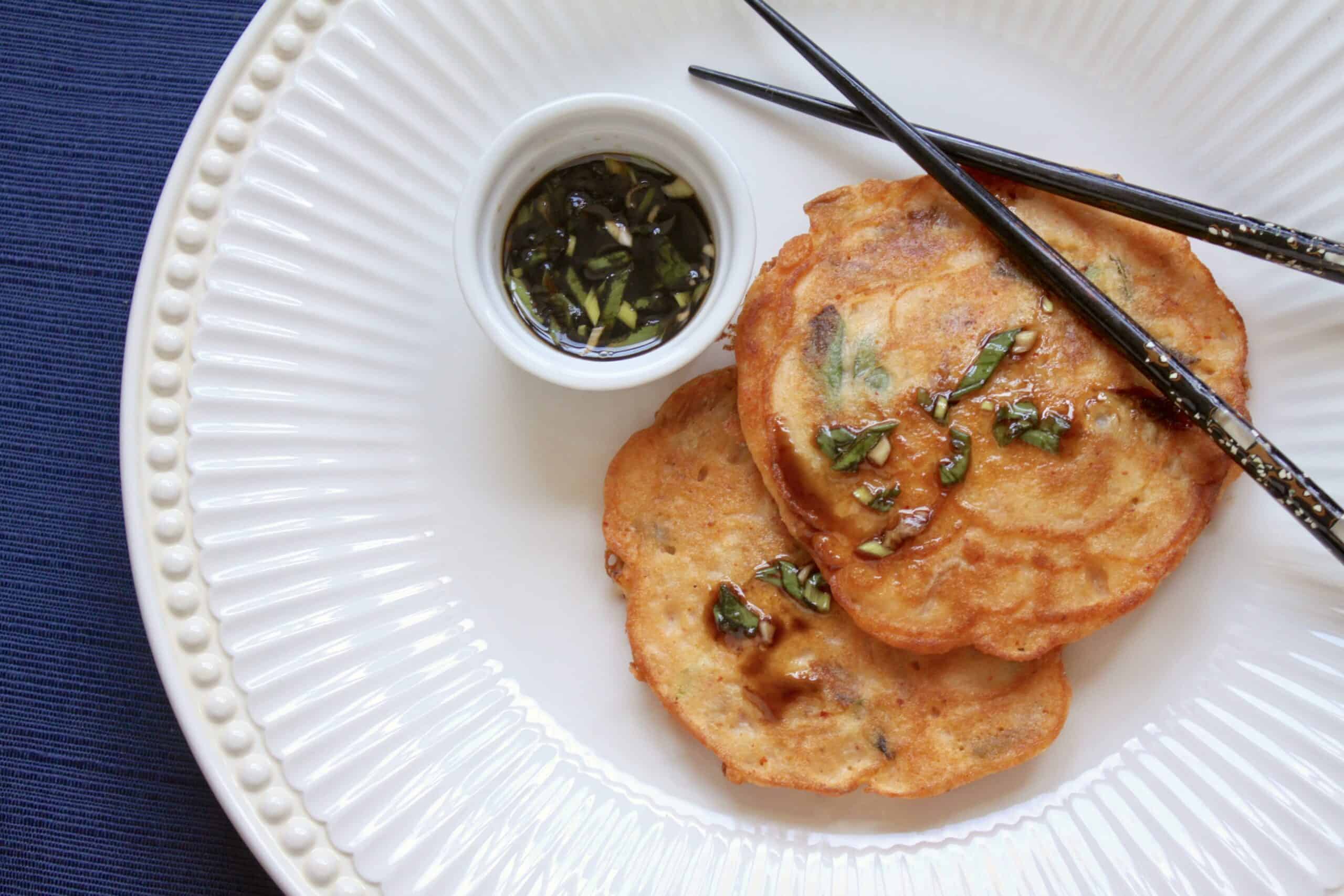 mung bean pancakes on a plate with chopsticks