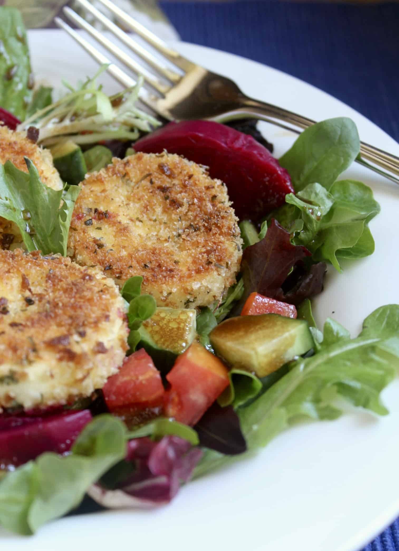 beet goat cheese salad in a white bowl