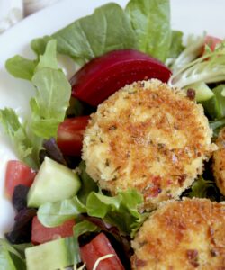 breaded goat cheese and beets on a salad