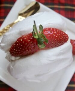 cream meringue with a strawberry