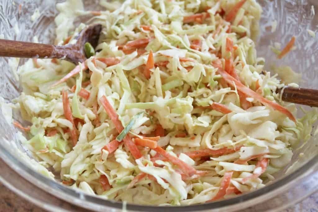 making spicy cole slaw in a bowl