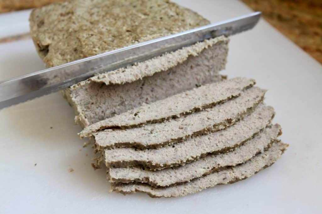 homemade Greek gyro meat being sliced