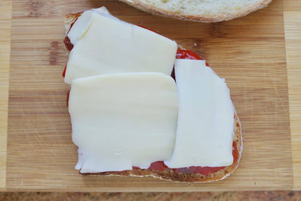 Making a Grilled cheese with red pepper