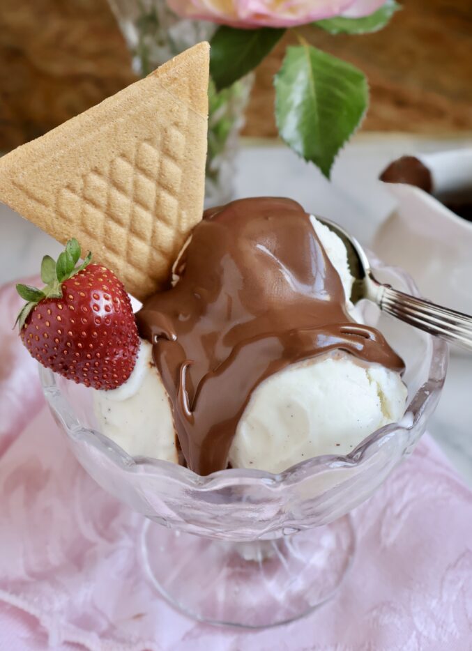homemade chocolate shell with ice cream and strawberry