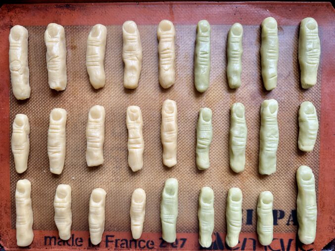 plain and green witches fingers ready to bake