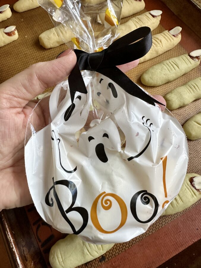 treat bag with witches fingers inside