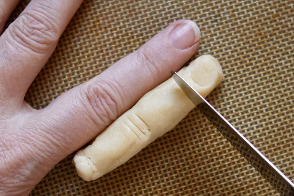 making Witches' fingers using my finger as a guide