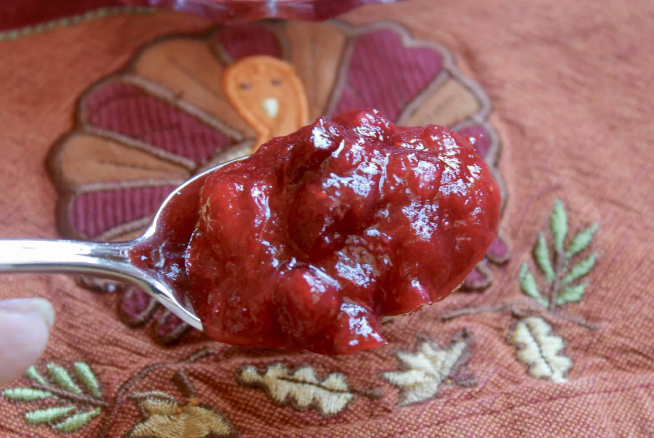 Orange Cranberry Sauce with grand marnier in a spoon