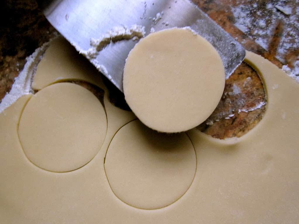 cutting out empire biscuits from dough