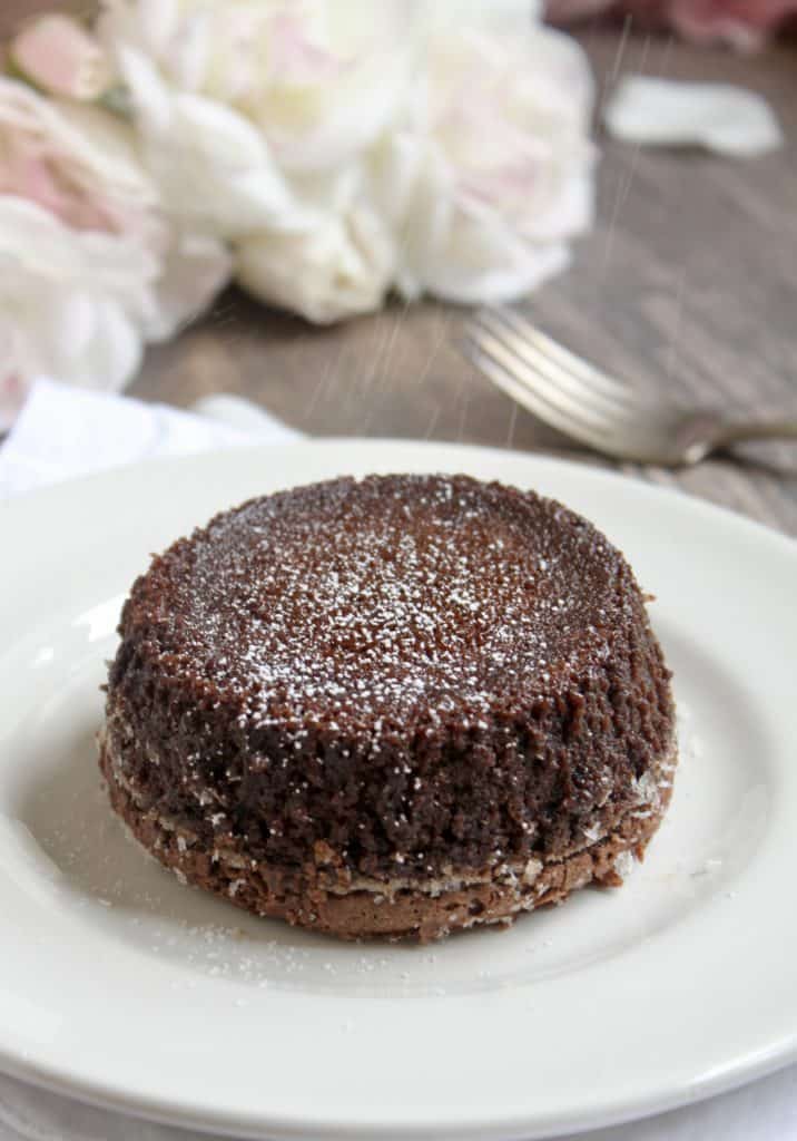 Dusting molten chocolate lava cakes with powdered sugar