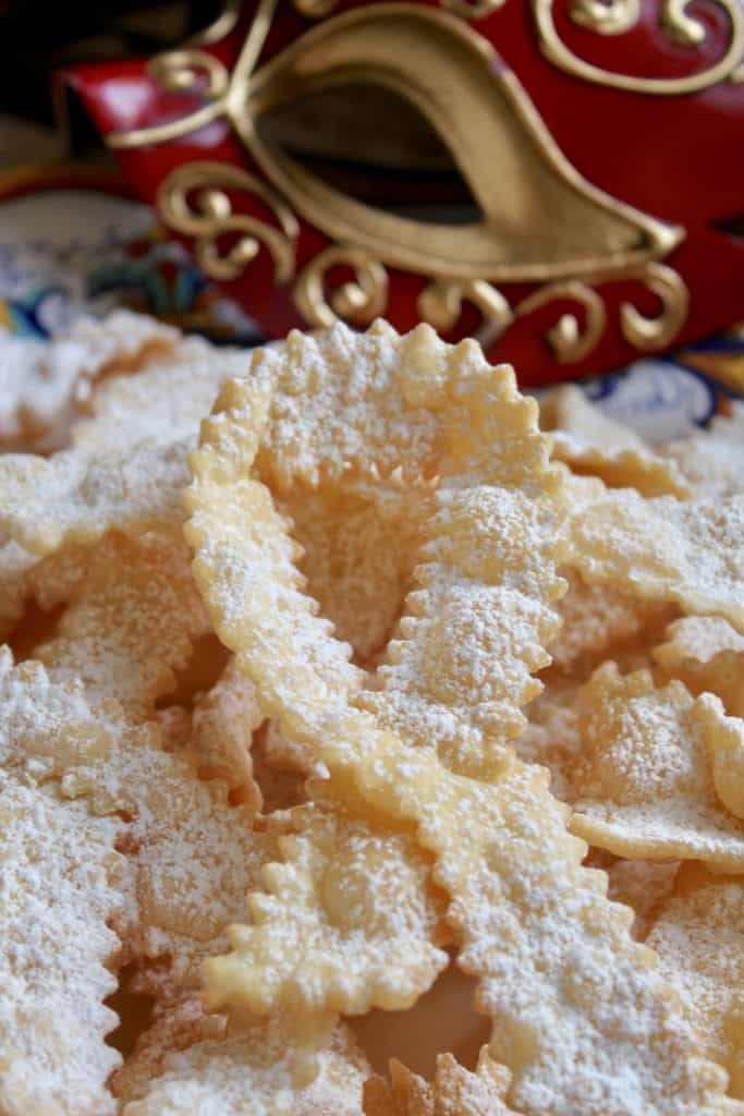 Cioffe dusted in sugar with Venetian carnevale mask