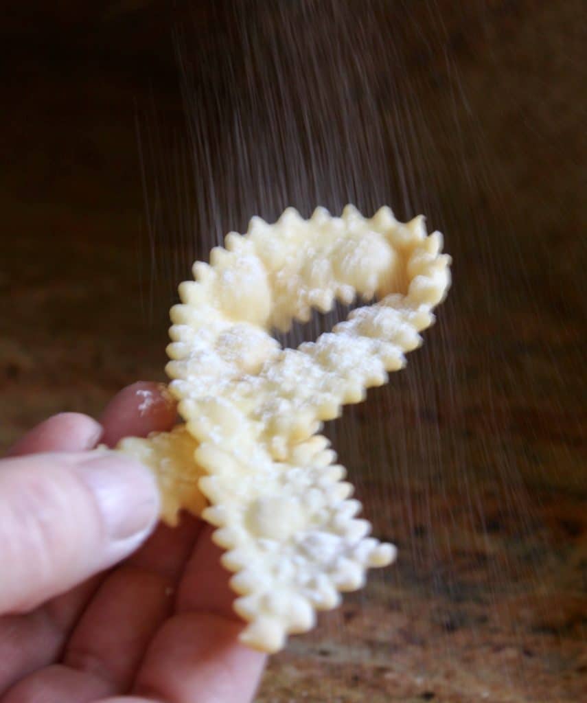 dusting cenci with sugar