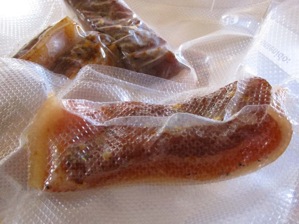 homemade pancetta in sealed bags