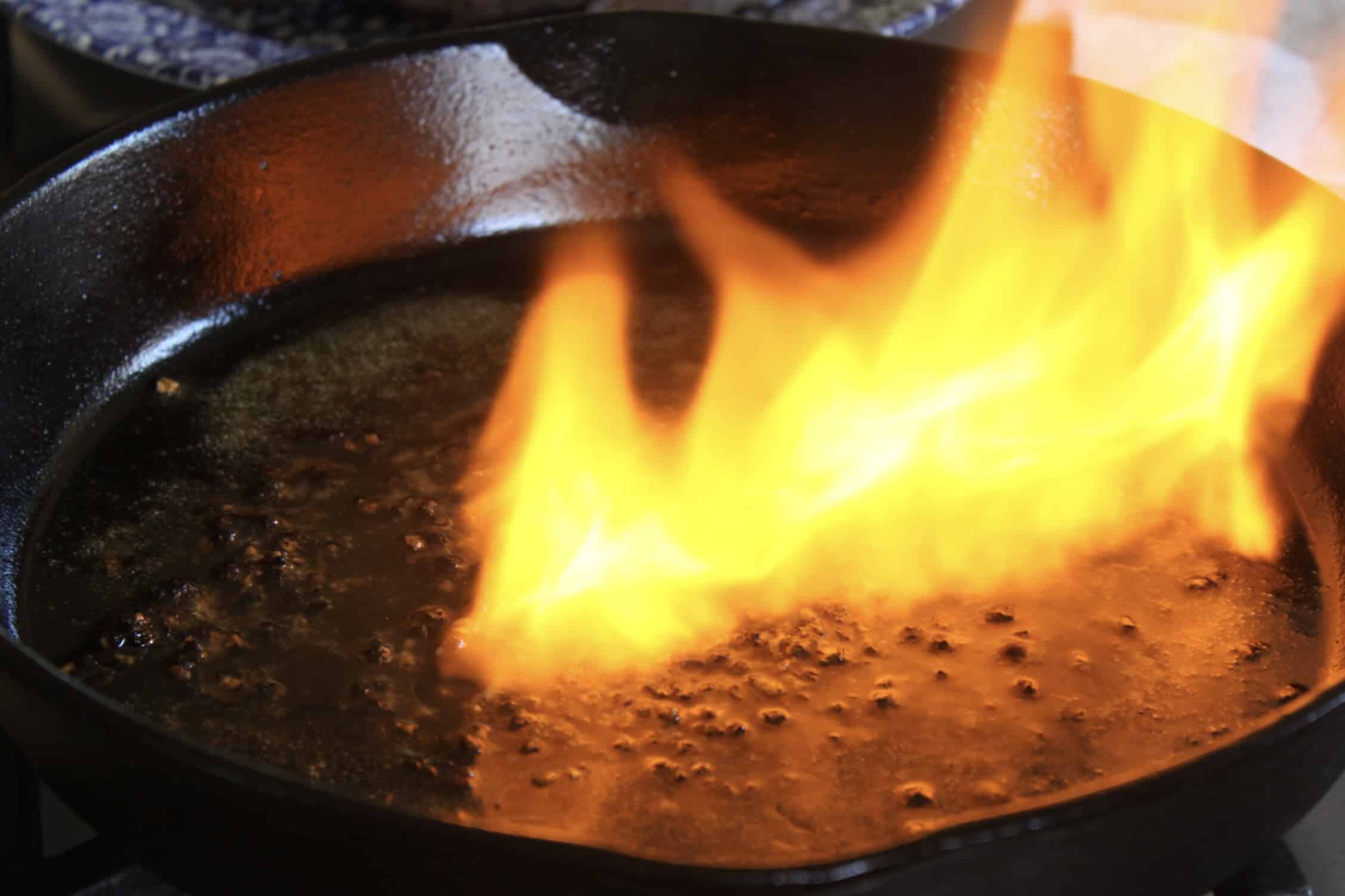 flaming brandy in a pan