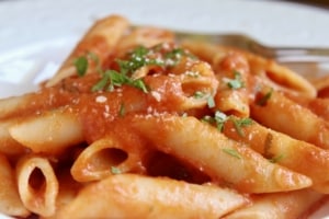 penne alla vodka with cheese and parsley