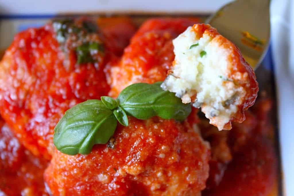 Italian ricotta dumplings with tomato sauce 