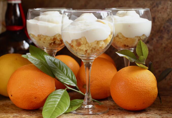 Boodles Orange Fools in stemmed glasses with oranges