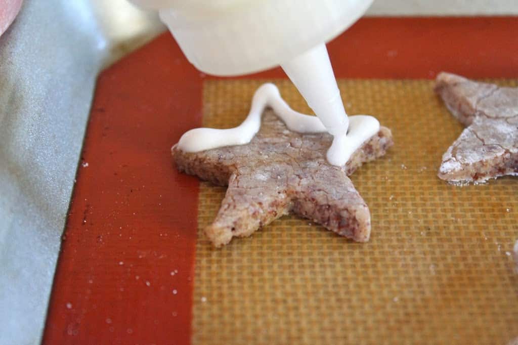 decorating a star cookie