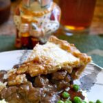 Steak Pie with Peas, Mashed Potatoes and Gravy