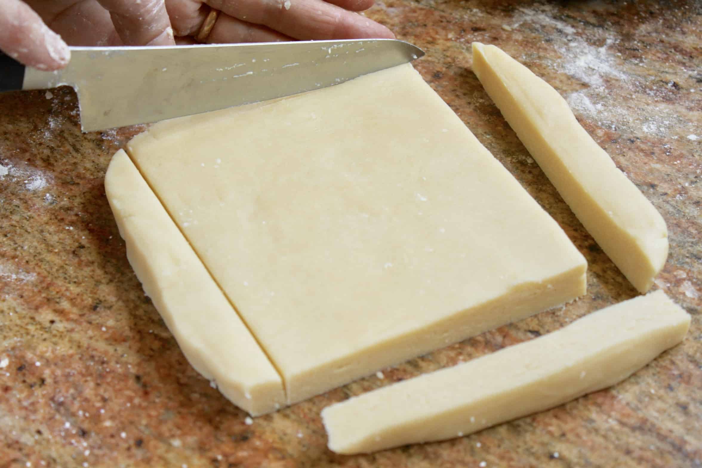 trimming shortbread dough from my shortbread cookie recipe