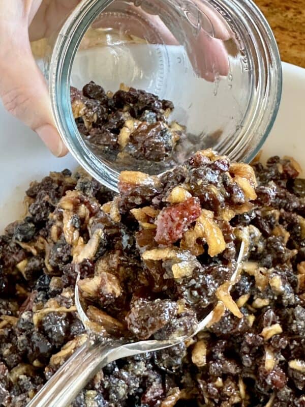 spooning mincemeat into a jar