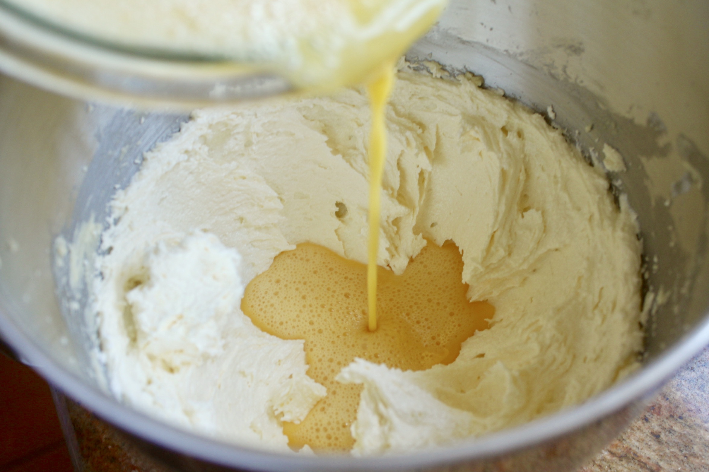 adding egg to butter and sugar