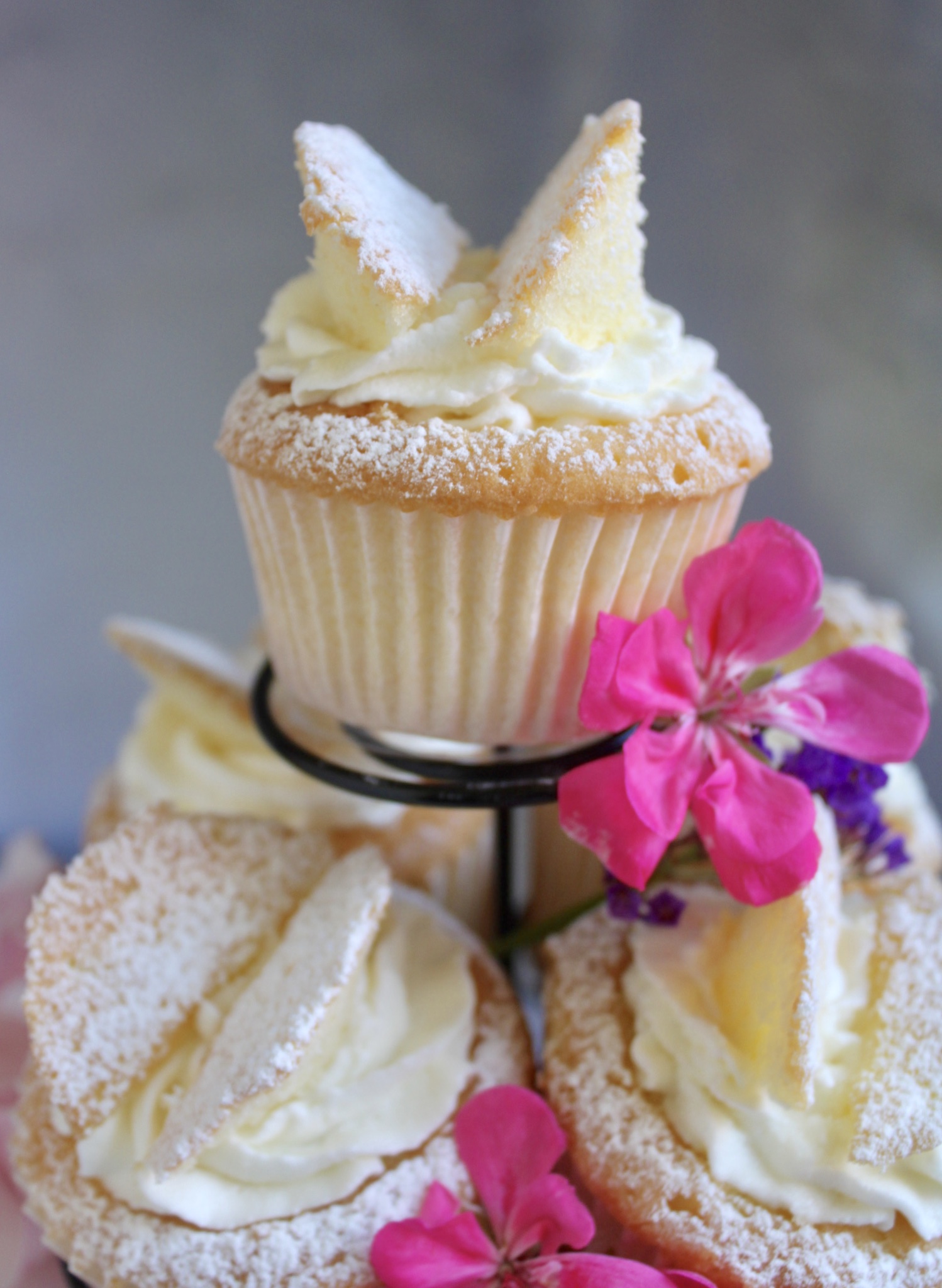 butterfly cupcakes on stand