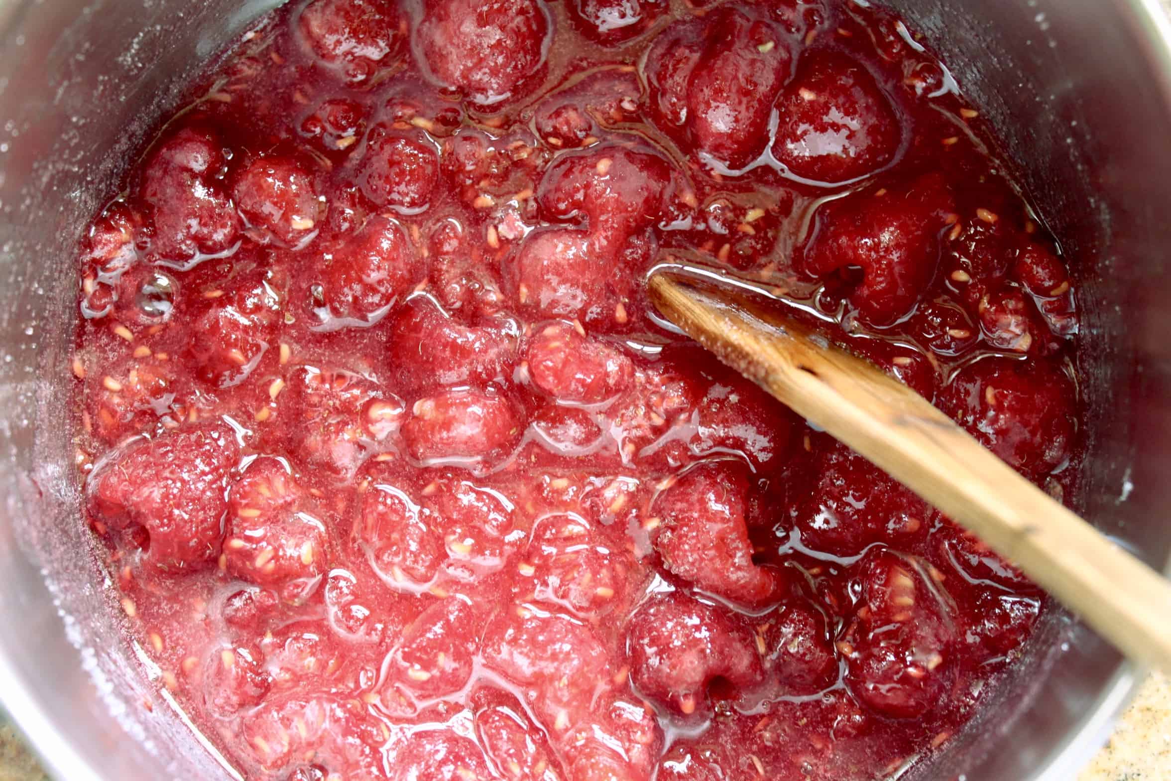 raspberries cooking in a pot