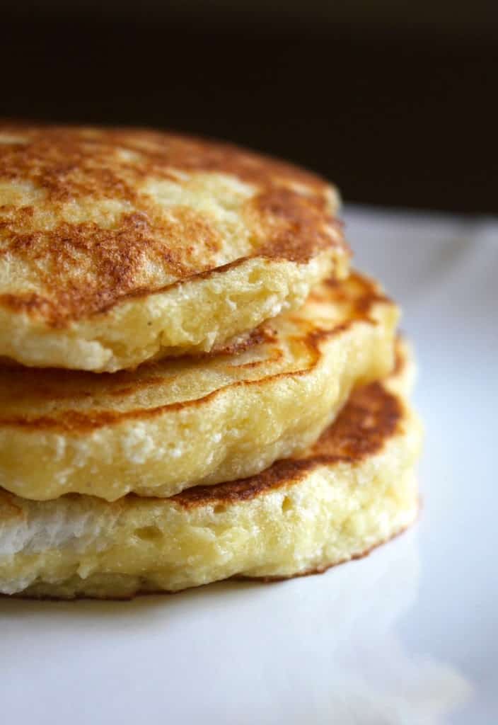 3 Lemon Ricotta Pancakes in a stack close up