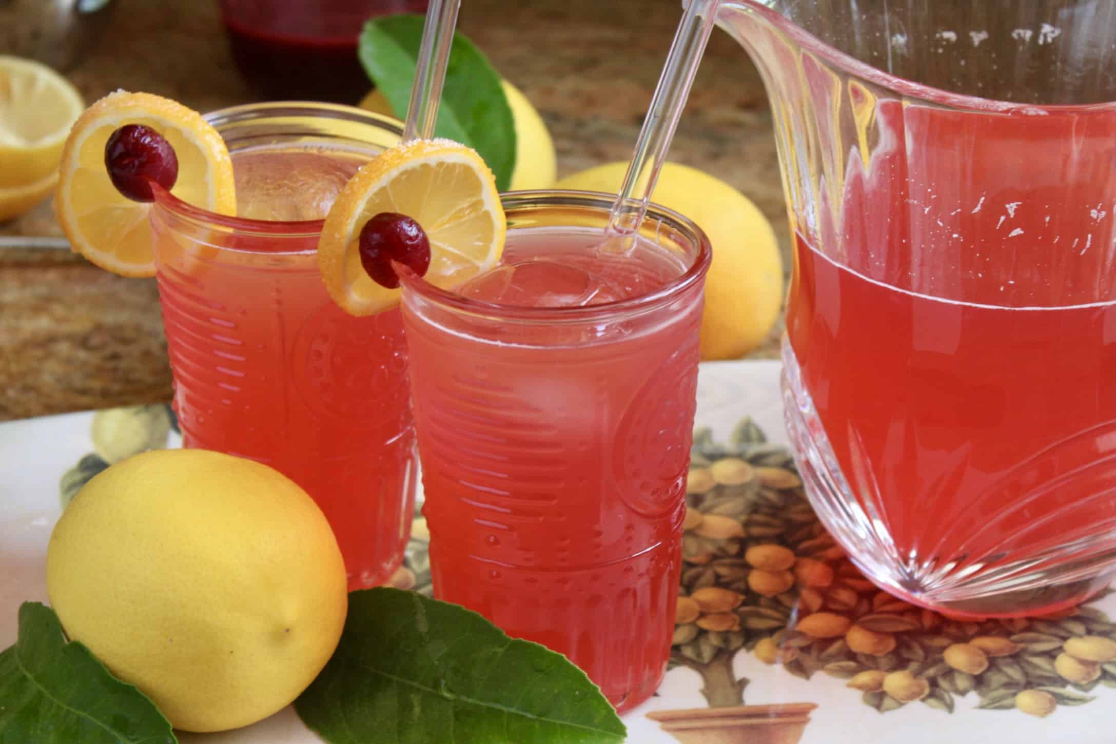 cranberry lemonade with glass straws