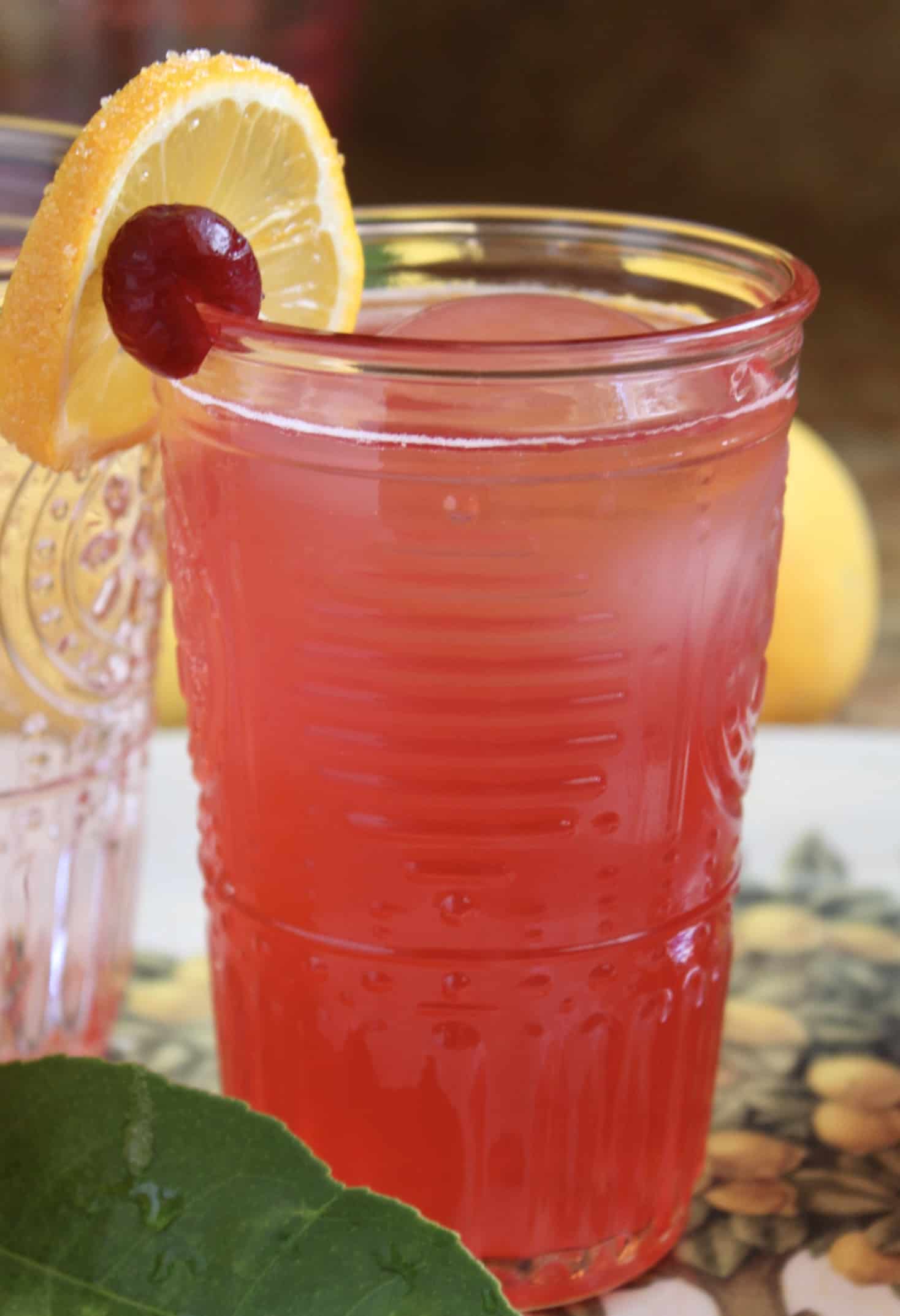 glass of cranberry lemonade with garnish