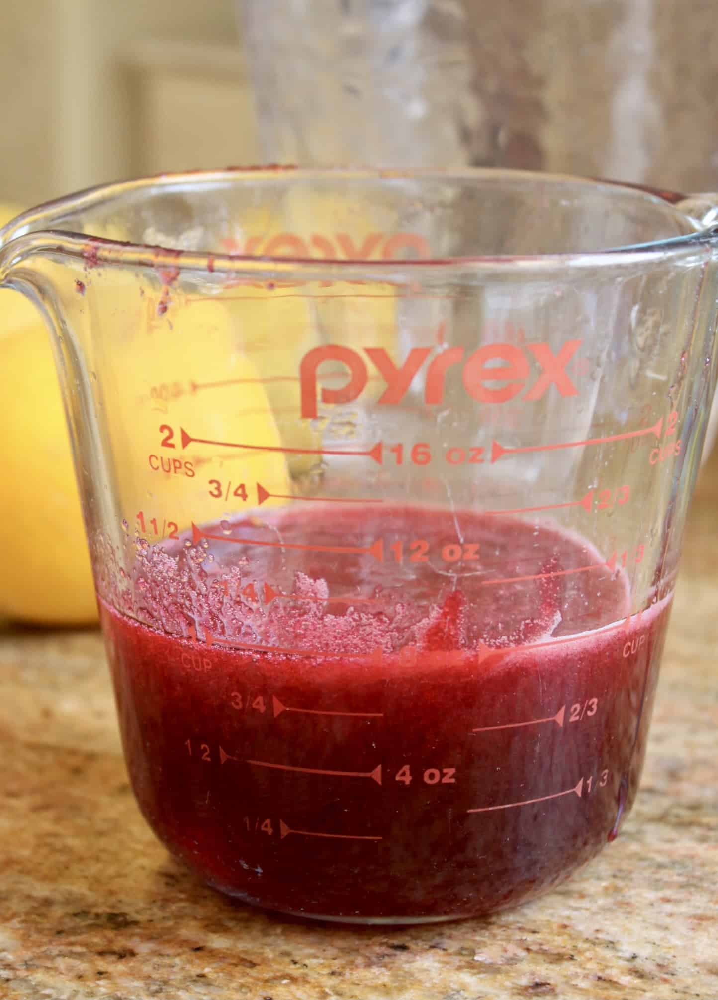 cranberry syrup in a jug