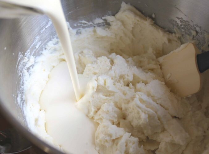 Mixing cheesecake filling.