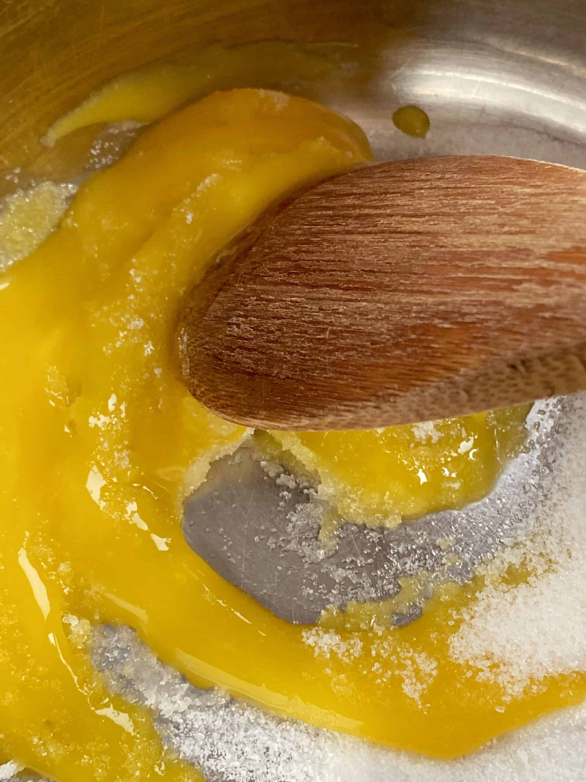 mixing egg yolks and sugar