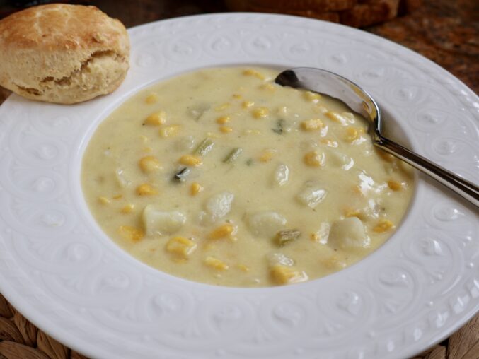 parsnip scone with corn chowder in a bowl