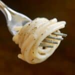 forkful of cacio e pepe spaghetti