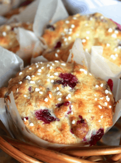 cranberry orange muffins in a basket