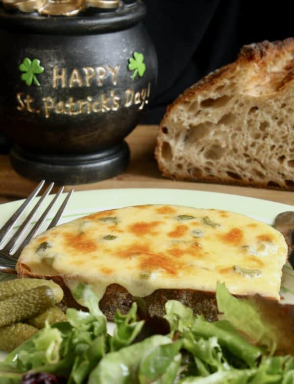 Irish rarebit with gherkins and salad and bread