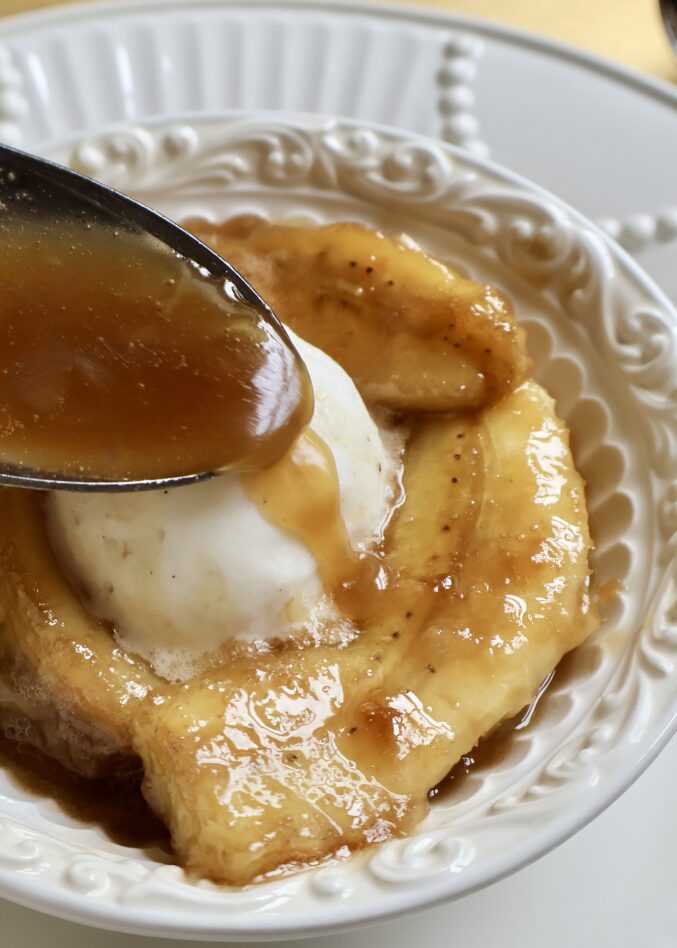 drizzling syrup over ice cream