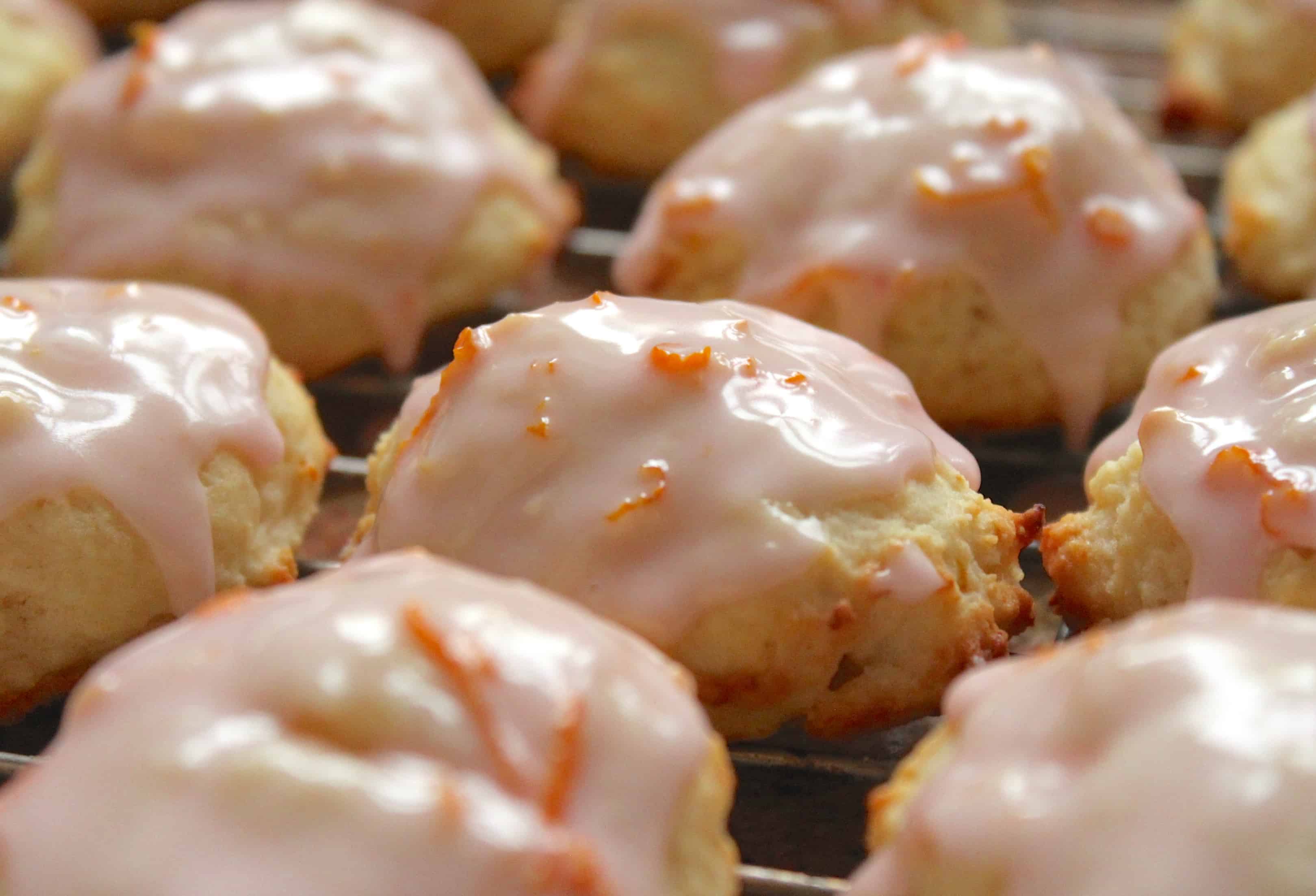 Blood orange ricotta cookies on a rack